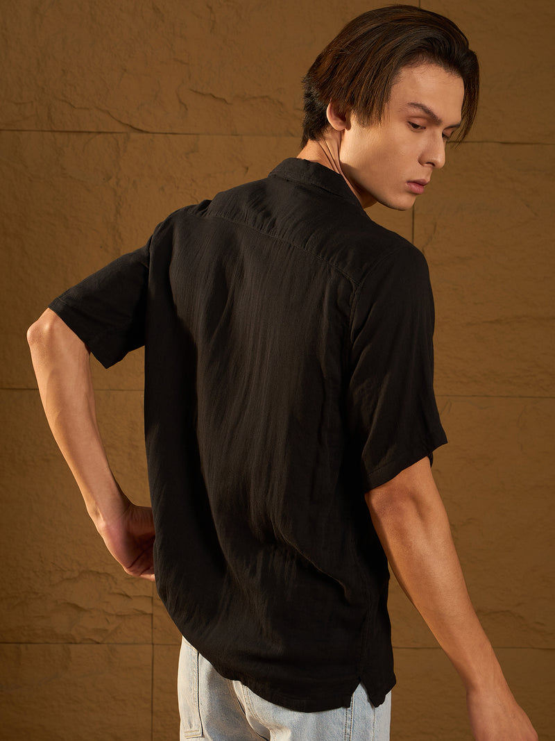 Black: Half Sleeves Muslin Oversized Shirt