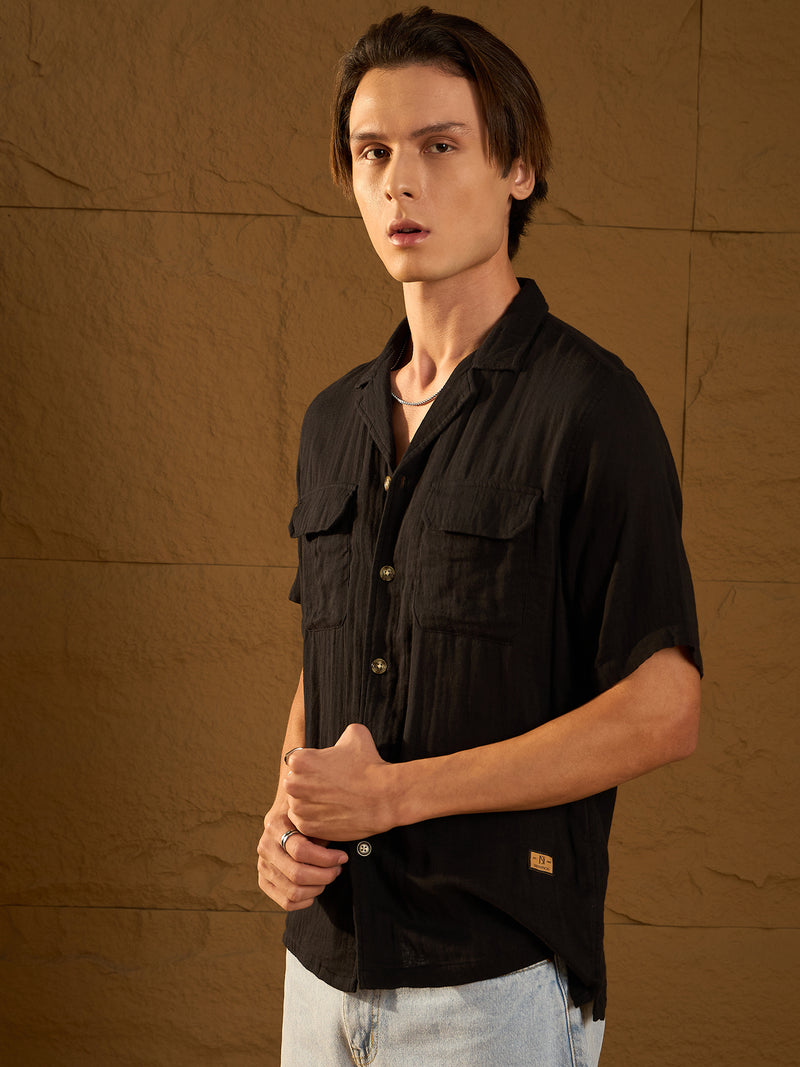 Black: Half Sleeves Muslin Oversized Shirt