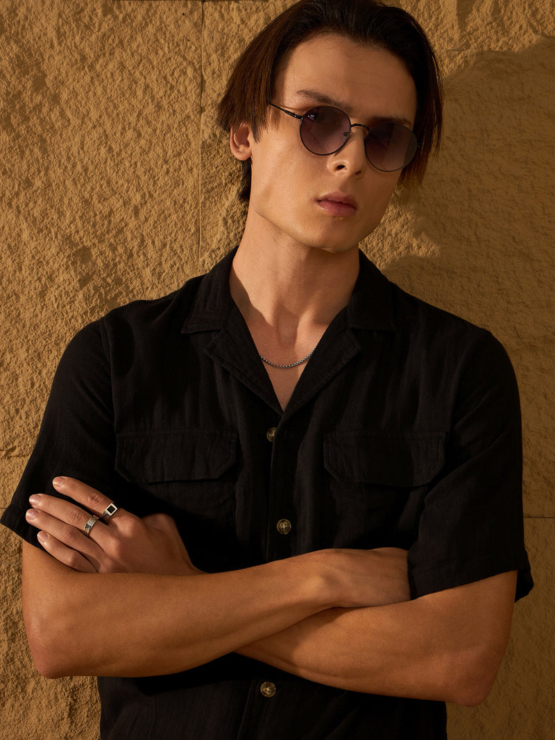 Black: Half Sleeves Muslin Oversized Shirt