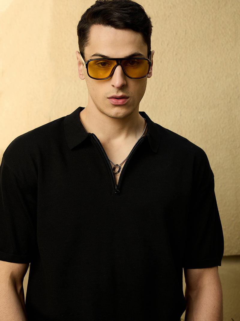 Black: Relaxed Zipped Polo T-Shirt