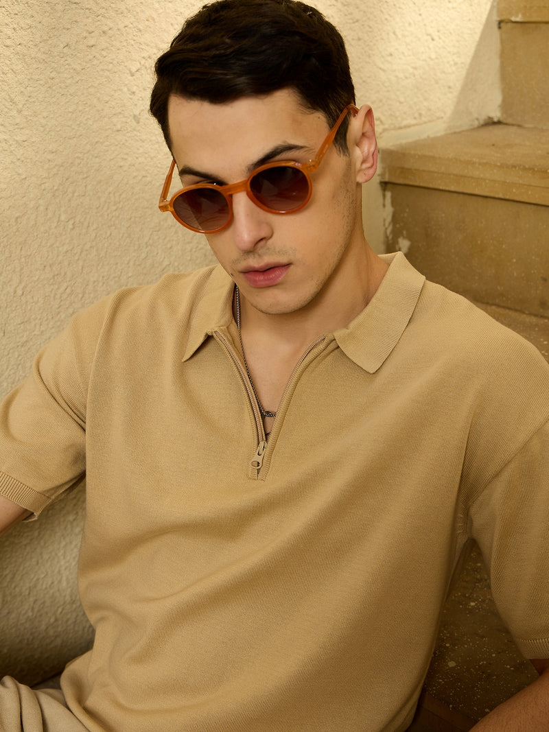 Beige: Relaxed Zipped Polo T-Shirt
