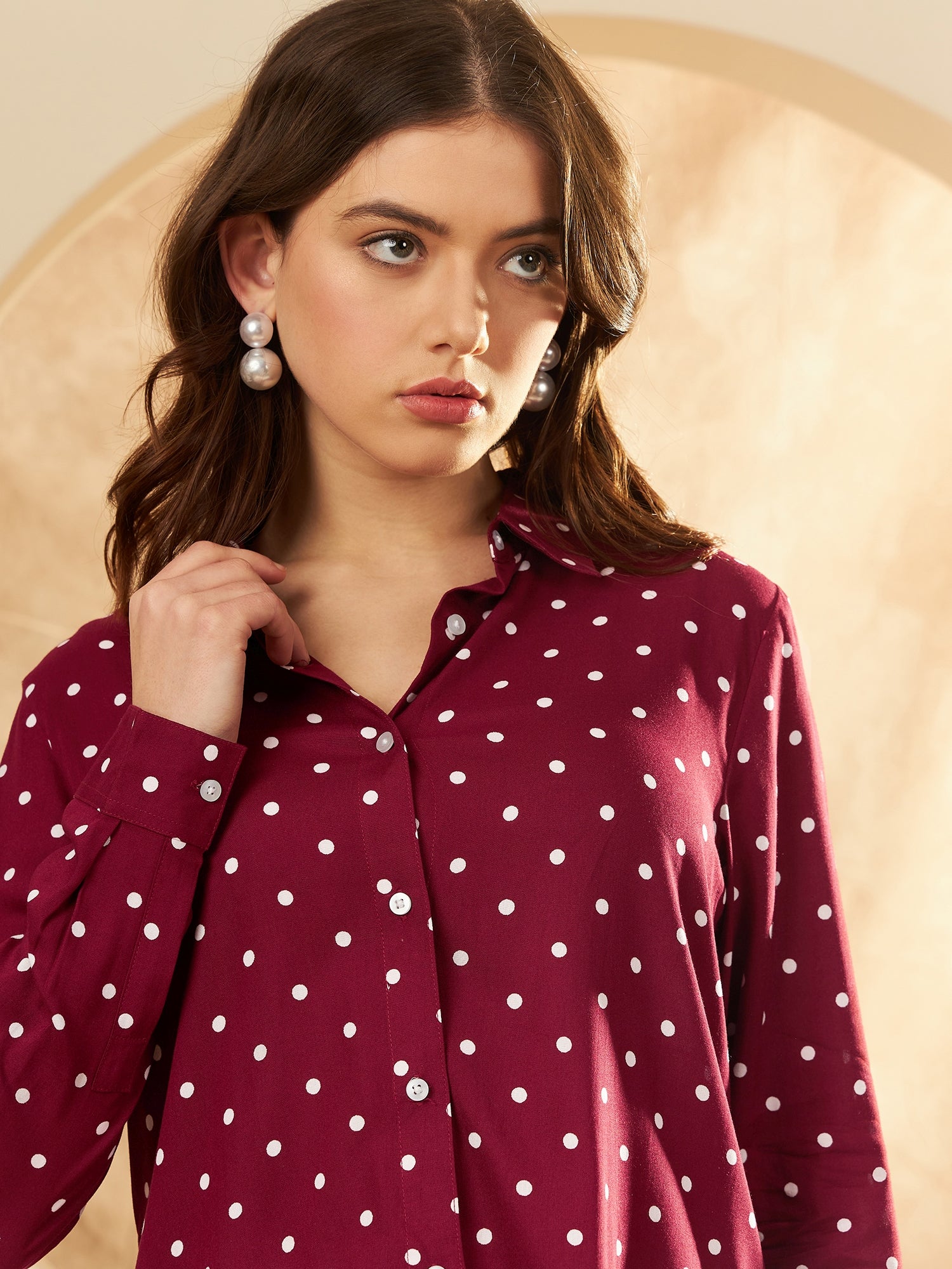 maroon polka dot shirt