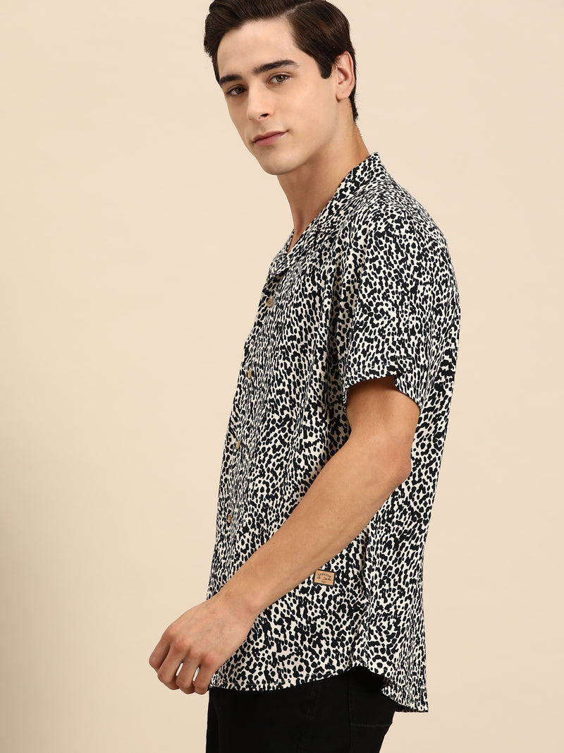 Cream & Black: Half Sleeves Cuban Collar Abstract Printed Shirt