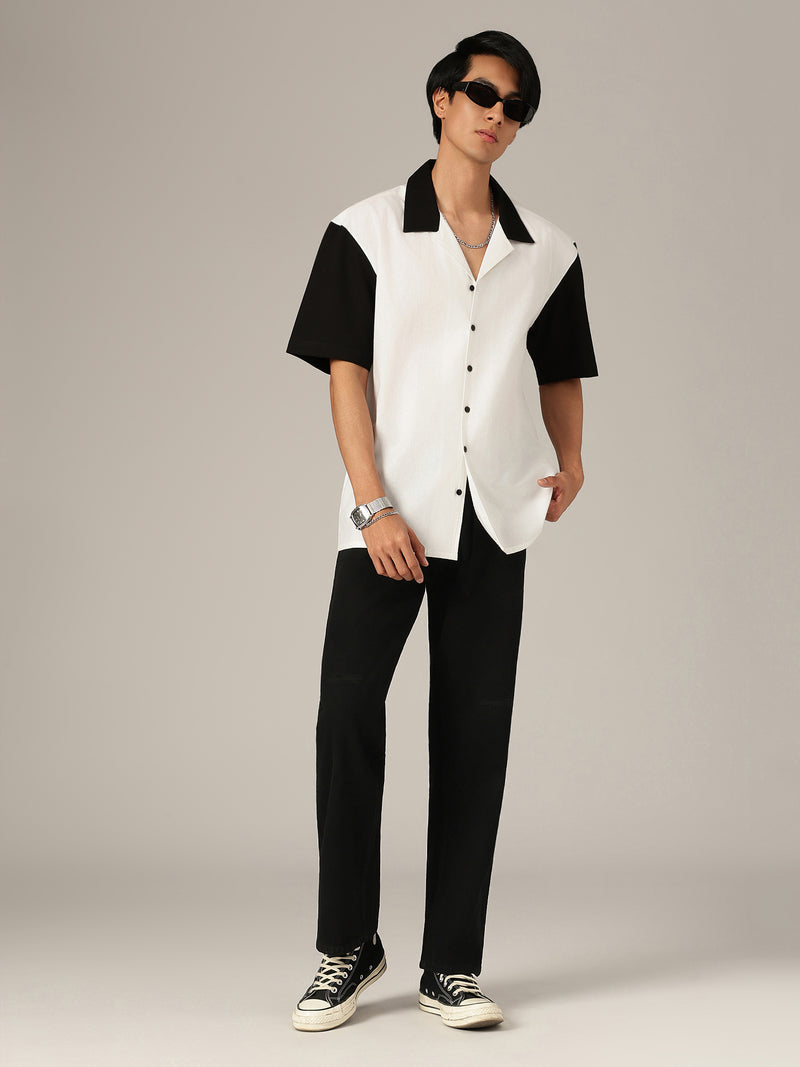 Black: Baggy Fit Distressed Jeans