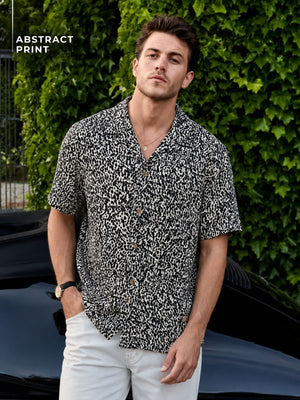 Cream & Black: Half Sleeves Cuban Collar Abstract Printed Shirt